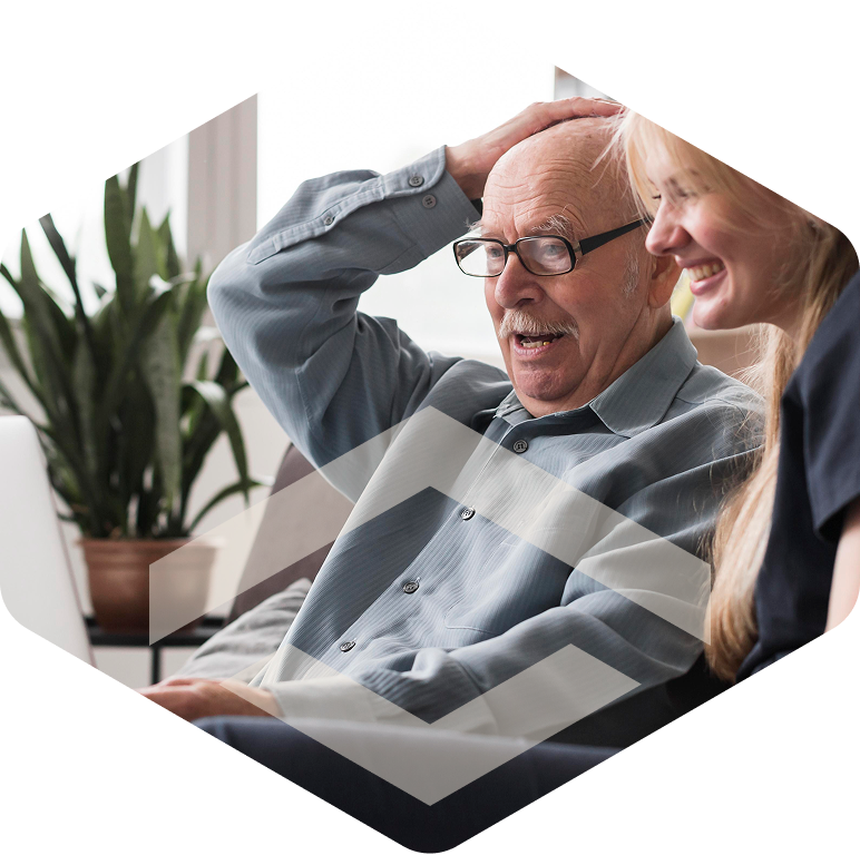 Caregiver supporting a memory care resident